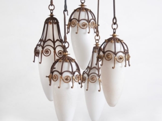 five hanging pendant lights by  EDGAR BRANDT
