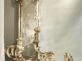 A Rare Rococo-revival gilt wood Thomas Johnson mirror