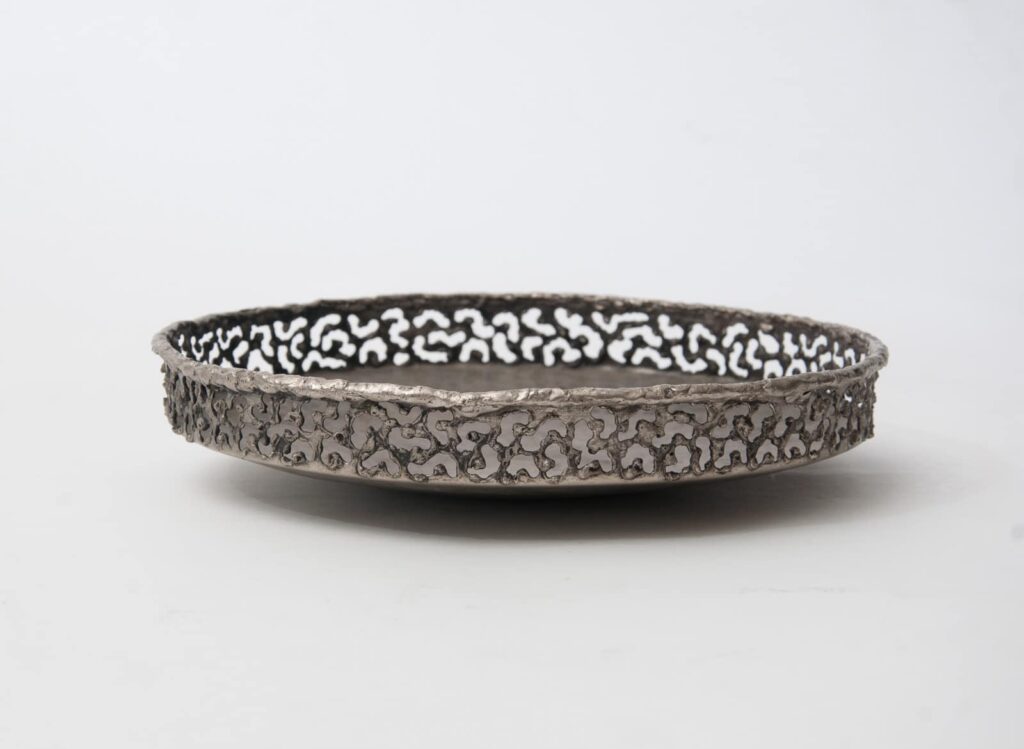 Torch cut and hammered shallow metal bowl by Marcello Fantoni-9