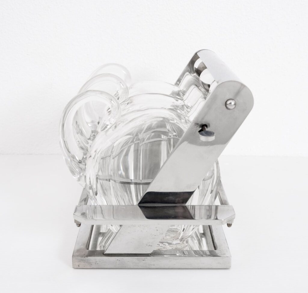 Jacques-Adnet-attributed-tantulus-containing-three-Baccarat-Carafes3