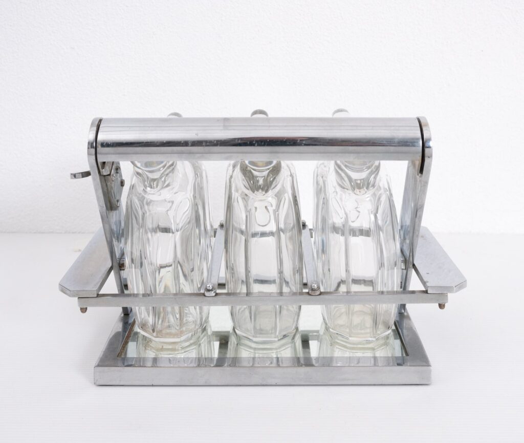 Jacques-Adnet-attributed-tantulus-containing-three-Baccarat-Carafes5