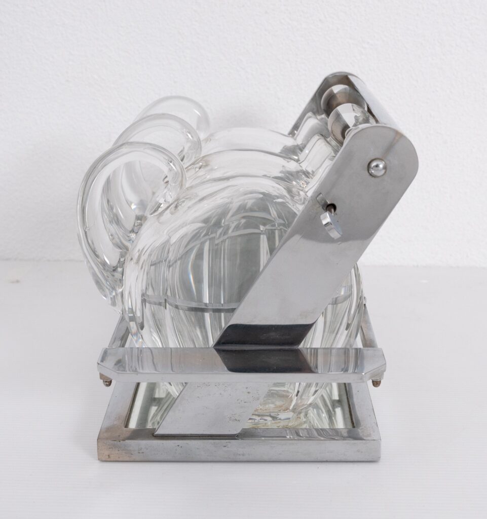 Jacques-Adnet-attributed-tantulus-containing-three-Baccarat-Carafes7