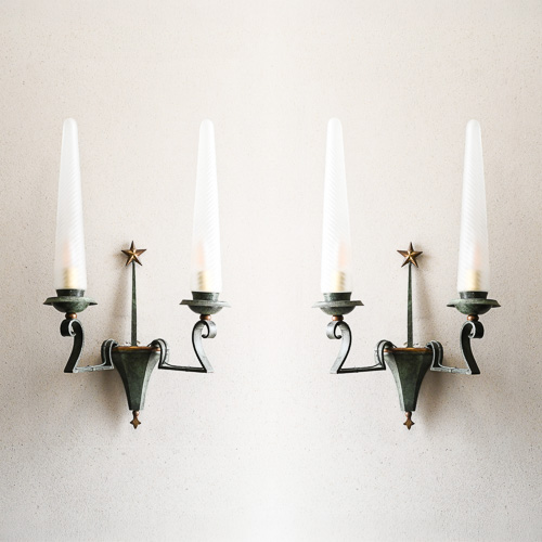 Pair of French two-branch wall sconces in the Gothic Medieval Revival taste, wrought metal, 1940s