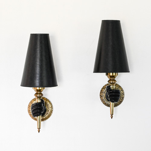 Pair of French hand and torch wall sconces with black shades, in the manner of Andr&eacute; Arbus
