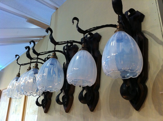 Set of four steel Arts & Crafts wall lights with Powell style shades